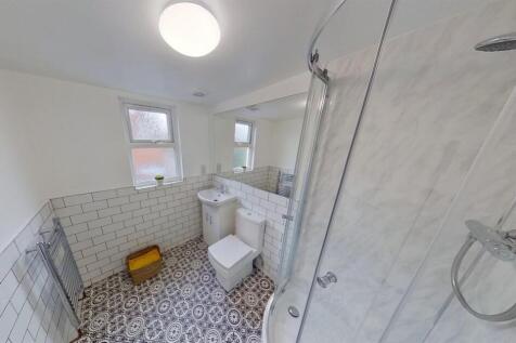 Bright modern bathroom with stylish tiling...