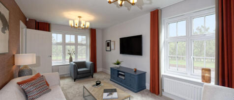 Bright living room with large windows, white walls, orange curtains, and modern furniture including