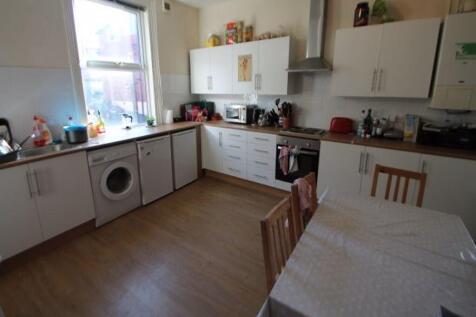 Bright and clean kitchen with ample natural lig...
