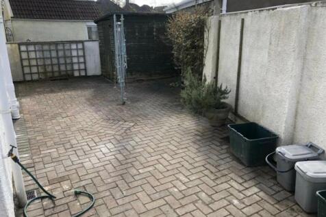A spacious and tidy garden area, perfect for re...