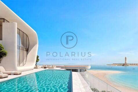 Modern building with a curvy design beside an infi