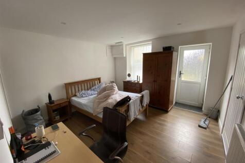 Bright master bedroom with ample floor space...