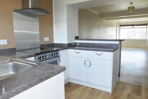 Modern kitchen with integrated appliances...