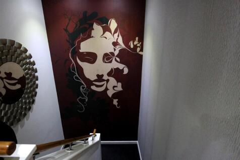 Decorative painted feature wall in a stylish en...