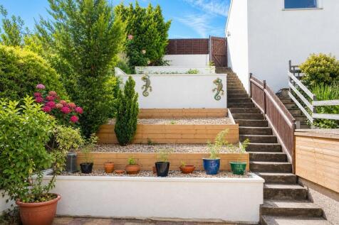 Beautifully terraced garden with vibrant plants...
