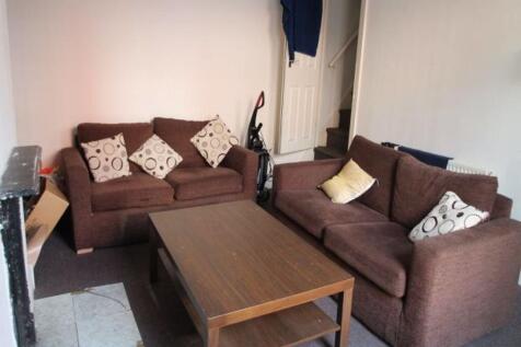 A contemporary and inviting living room featuri...
