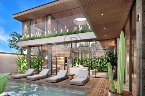 Modern luxury villa with large windows, multiple l