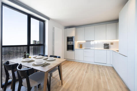 Experience culinary delight in this stylish kitchen with adjacent dining space, perfect for entertaining.