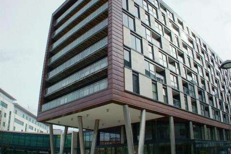 Modern apartment building with stylish facade...