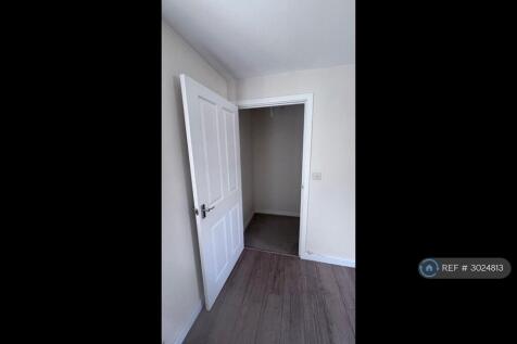 Opening To The Stairs And The Front Door
