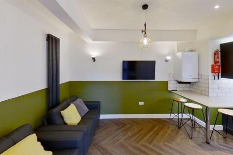 Modern living space with stylish parquet floori...