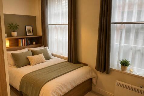 dressed studio bedroom.jpg