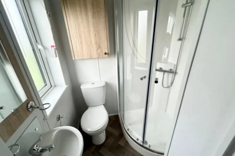 Modern En Suite Bathroom With Corner Shower, Toile