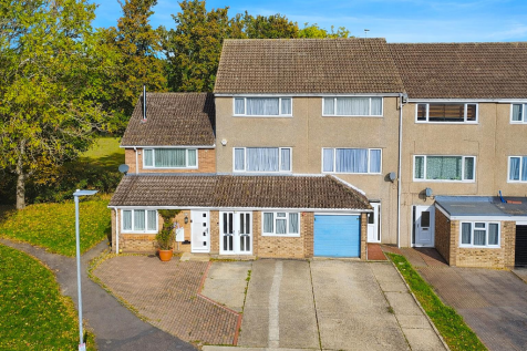 Semi-detached homes with garden views.png