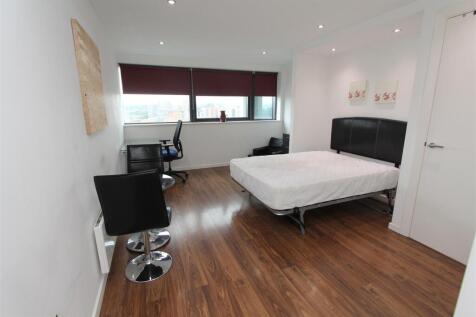 Bright modern bedroom with dedicated study spac...