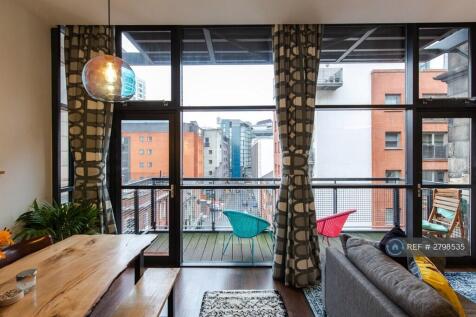 Living Area With View Of Private Balcony