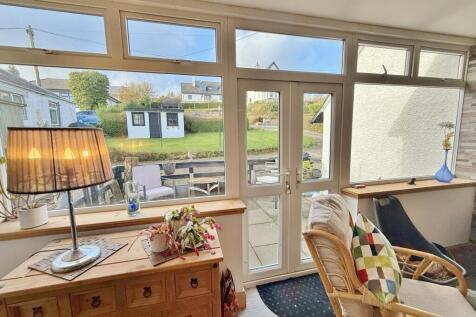 French doors to rear gardens and patio