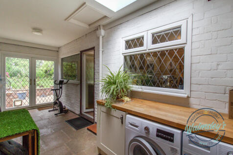 Utility area between garage and main house_