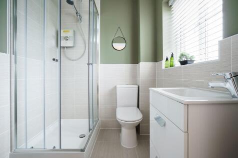 Bedroom one boasts an en suite shower room