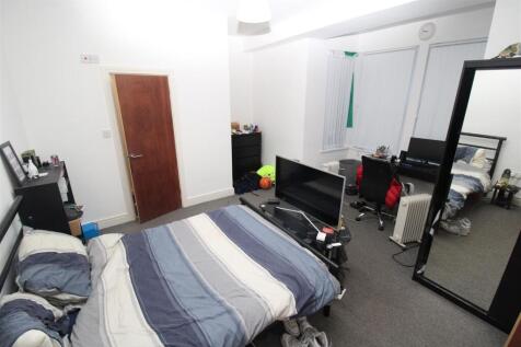 Spacious bedroom with double bed and desk space...