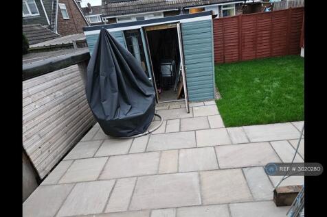 Rear Garden With Cladded Garage