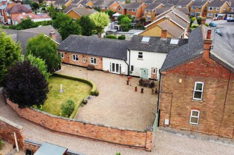 Aerial view showing private plot, gated access and