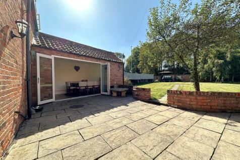 Generous Paved Entertainment Area 373