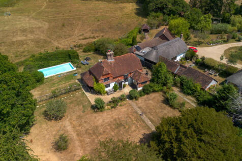 Aerial view of the house, pool and grounds