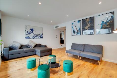 Elegant spacious lounge with stylish art pieces...