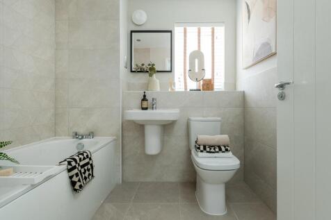 A generous family bathroom completes this home
