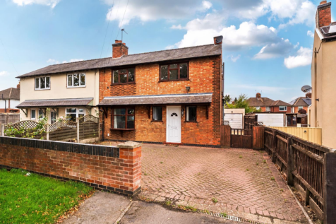 Tidy Herringbone Driveway Semi-Detached Home.png