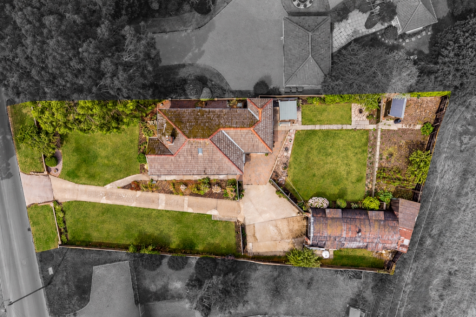 Aerial Property with Greener Lawns