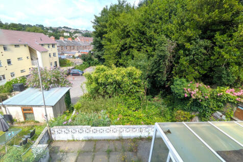 View over patio and garden from B3