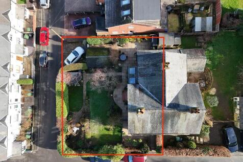 Aerial view showing plot, drive &amp; garage