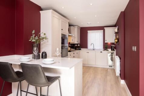 Diner inside the Wichelstray 4 bedroom home at Orchards Rise
