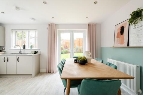 The open plan kitchen/diner opens out to the garden