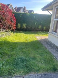 Bright, spacious private garden with lush lawn...