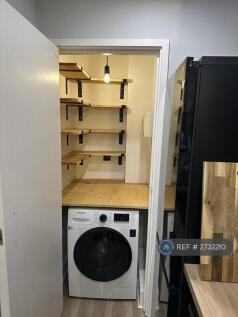 Practical Utility Cupboard With Ample Shelving