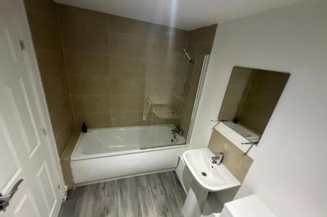 Modern bathroom suite with elegant tiling....