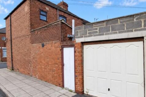 GARAGE AND SIDE ELEVATION