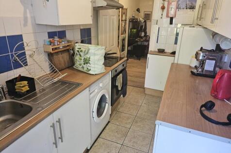 A well-organized kitchen area featuring essenti...