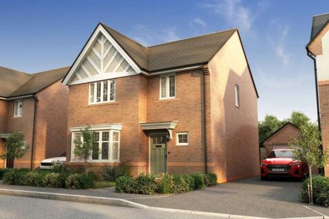 A two-story brick house with a gabled roof