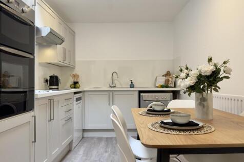 A modern and clean kitchenette perfect for stud...