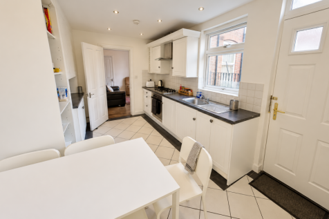 Bright Modern Galley Kitchen Dining Area