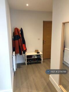 Entrance With Washer/Dryer Cupboard