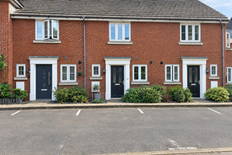 Red Brick Townhouses with Garden Entrances.png