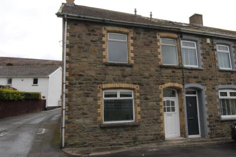 Charming stone-fronted end-of-terrace home...