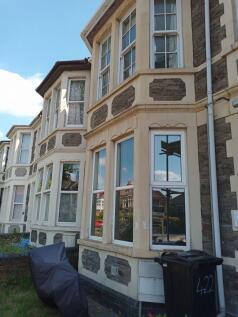 Stunning period stone facade with bay windows...