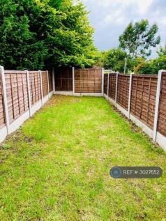 Lawned Back Garden With Metal Shed/Bike Store