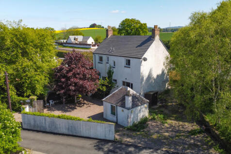 Front Elevation, Driveway and Gardens